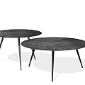 Two Round Coffee Tables With Cracked Texture Dark Surface And Black Slender Legs