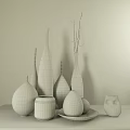 Colorful Decorative Ornament Set With Various Shaped Vases And Small Green Decor