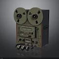 Vintage Electronic Tape Recorder With Two Reels Knobs Control Panel And Headphones
