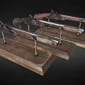 Two Antique Rifles With Wooden Stocks And Metal Components On Display Stands