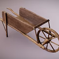Vintage Handcrafted Wooden Wheelbarrow With Rustic Frame And Spoked Wheel