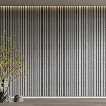 Gray Vertical Striped Background Wall in Interior With Decorative Stones Yellow Branches And Wooden Floor