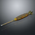 Green Military Bomb With Yellow Stripes And Text Markings On Cylindrical Body