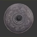 Intricately Carved Circular Sculpture Artwork With Central Hole and Ornate Decorative Patterns