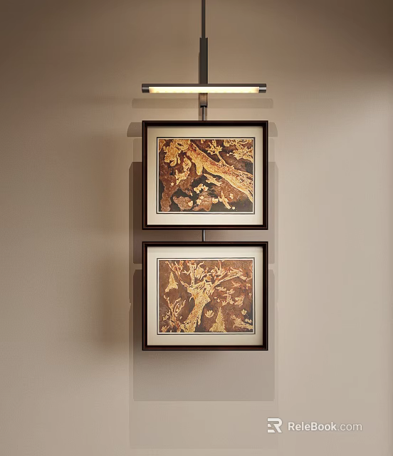 Two Abstract Paintings in Dark Frames Hung on Light Colored Wall With Light Above 3d model
