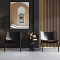 Stylish Black Casual Sofa Set With Vertical Striped Walls Marble Table And Arched Art Decorations