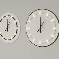 Two Modern Wall Clocks With Illuminated Markers Black Hands And Different Frames
