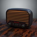 Vintage Headphone Speaker With Retro Grille Design And Metallic Body On Textured Tabletop