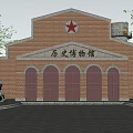 Historical Museum Red Brick Building with Arched Doors Red Star Emblem Surrounded by Trees