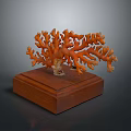 Artistic Orange Branch Shaped Coral Sculpture Displayed On Wooden Square Base