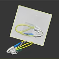 Medical Device With Yellow Green Tubes And Transparent Connectors On White Paper