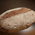 Traditional Artisan Rustic Bread With Crusty Exterior And Whole Grain Texture