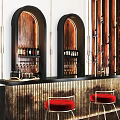 Modern Bar Interior With Arched Wine Racks Red Stools And Metallic Counter