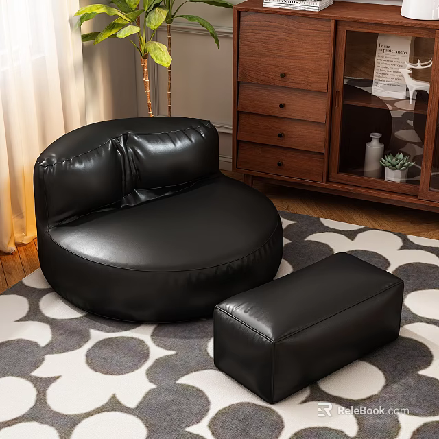 Black Leather Round Single Sofa With Matching Ottoman On Patterned Rug In Living Room 3d model 