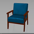 Comfortable Blue Upholstered Chair With Red Wooden Arms Backrest And Legs