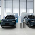 RIVIAN Car Showroom Displaying Two Blue Vehicles In Modern Spacious Interior