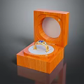 Gold Ring With Blue Gemstones In Open Wooden Box With White Padding