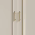 White Cabinet Doors Featuring Sleek Golden Handles And Minimalist Design Elements