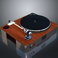 Vintage Turntable With Wooden Surface Black Platter And Metal Tonearm