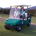 Two People Riding Golf Cart On Grassy Course 3d model