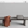 Modern Gray Striped Ottoman With Brown Throw Blanket And Metal Legs