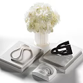 Modern Decorative Ornament Set With White Flower Bouquet Stacked Books And Sculptures For Home Decor