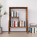 Wooden Open Bookcase With Books On Multiple Shelves And Potted Plant On Wooden Floor