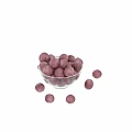 Fresh Ripe Red Plums in Transparent Glass Bowl with Scattered Ones