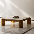 Modern Coffee Table With Glass Top And Wooden Legs In Bright Room With Natural Light