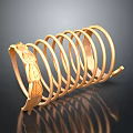 Golden Sculpture Carving With Intricate Circular Rings And Leaf Decorations