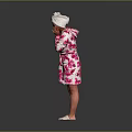 Pink Floral Bath Robe With White Towel On Head Standing Against Gray Background