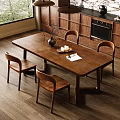 Wooden Dining Table With Four Chairs Vase Dried Branches Candles Tray And Open Book