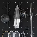 Sports Equipment Wall Display With Badminton Tennis Rackets Bicycle Skateboards And Tires