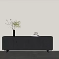 Dark Colored Entryway Console Table With Circular Pattern Design Vase Branches Books And White Decor 3d model