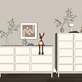 White Entryway Cabinet And Sideboard With Deer Ornament Potted Plants Framed Art Wooden Floor