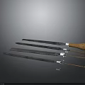 Set Of Kitchen Knives With Black Blades Wooden Handles And White Accents