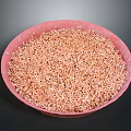 Pink Ceramic Bowl Filled With Brown Grains For Daily Household Use