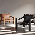 Modern Brown And Black Leather Lounge Chairs With Wooden Arms And Sunlight Stripes