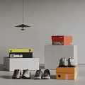CAT and PUMA Shoes Display with Colorful Shoe Boxes on White Stands
