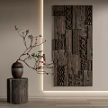 Wooden Wall Decor with Intricate Carved Patterns and Tree Stump Base Vase with Red Berry Branch