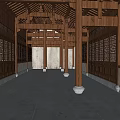 Traditional Ancient Chinese Courtyard Architecture With Grey Walls Black Tiled Roofs And Wooden Columns