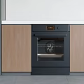 Built in Oven as Modern Kitchen Appliance with Wooden Cabinets and White Countertop