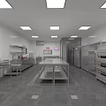 Spacious Commercial Kitchen With Stainless Steel Worktables Ovens And Storage Cabinets
