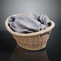 Wicker Storage Basket Containing Soft Gray Cloth For Daily Household Items