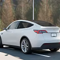 White Tesla Model Y SUV With Modern Exterior Black Roof And Alloy Wheels On Road