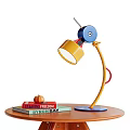 Unique Colorful Table Lamp on Round Wooden Table with Books and Decorative Pumpkin
