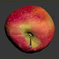 Fresh Red and Yellow Apple with White Spots and Glossy Surface on Black Background
