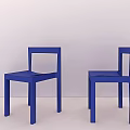 Two Blue Modern Leisure Chairs With Sleek Geometric Design In Light Room