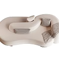 Modern Sectional Sofa with Neutral Color Pillows and Cozy Throw Blanket