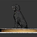 Black dog with red collar sits on round platform with gear patterns and orange edge